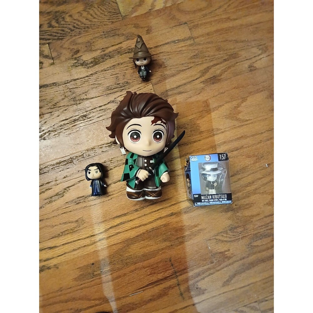 Funko mystery minis and a demon slayer bank